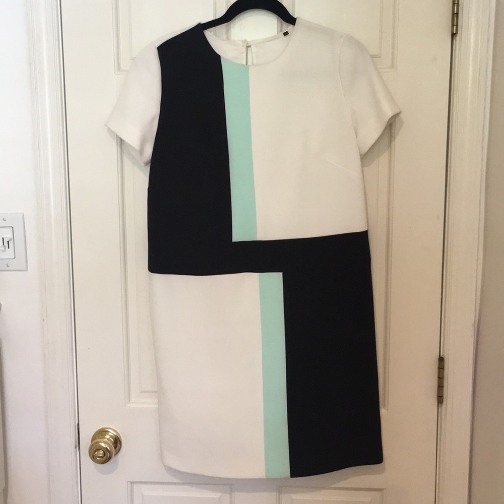 Colorblock white dress with black and blue accents